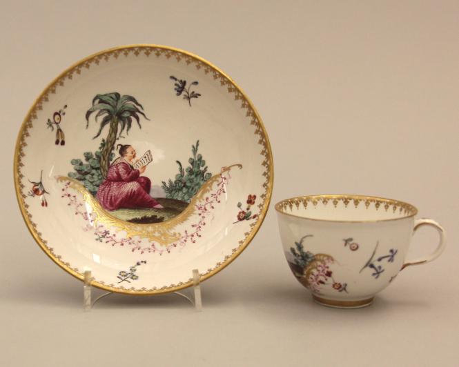 Cup and saucer with chinoiseries