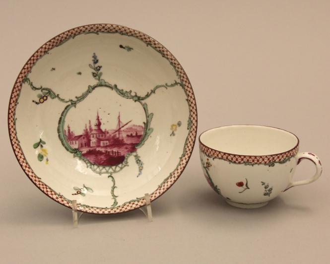 Cup and saucer with harbour scenes