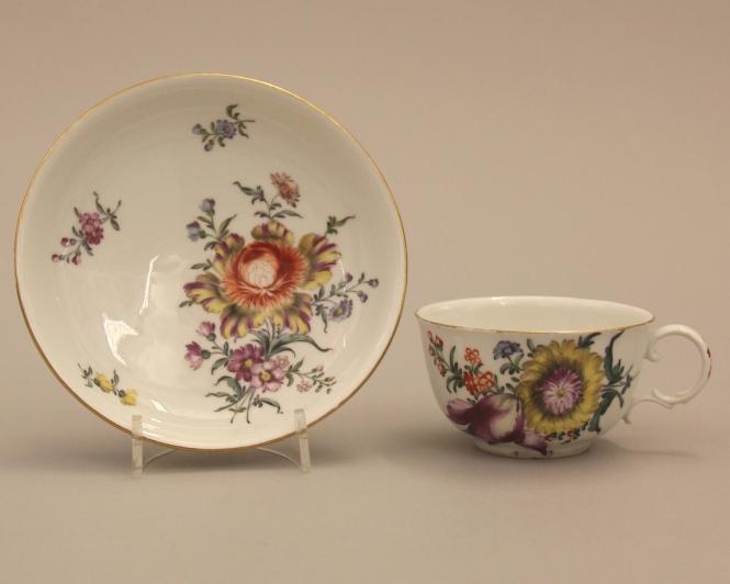 Cup and saucer with bouquets