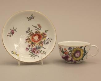 Cup and saucer with bouquets