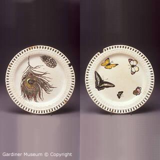 Pair of pierced dessert plates with feathers and butterflies