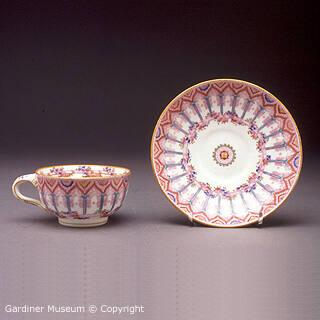 Cup and saucer with Gothic design
