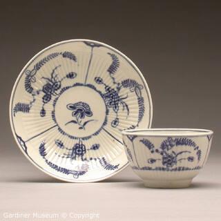 Tea bowl and saucer with "Immortelle" pattern